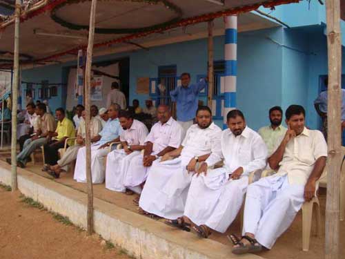 USC Members Watching Football Match From Pavilion